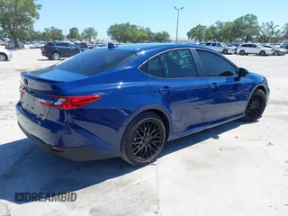2025 Toyota Camry LE with VIN 4T1DAACK3SU104152, listed as a IAAI auction lot 42039337 with 1,423 mi miles and . Bid and sale history available at DreamBid. Image 4.
