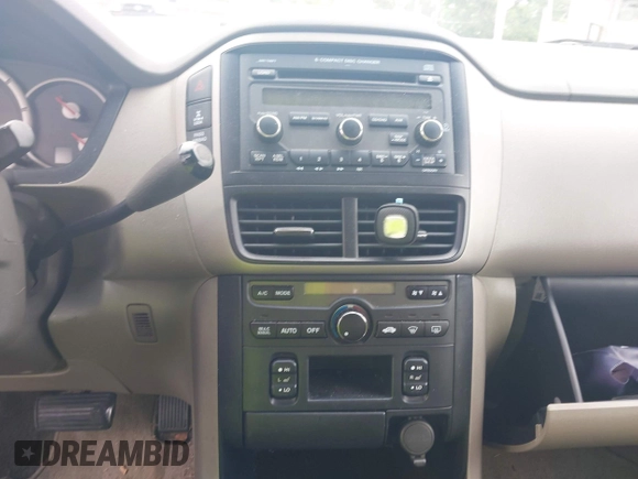 2006 Honda Pilot EX-L with VIN 5FNYF185X6B027885, listed as a IAAI auction lot 42132461 with 222,195 mi miles and . Bid and sale history available at DreamBid. Image 13.