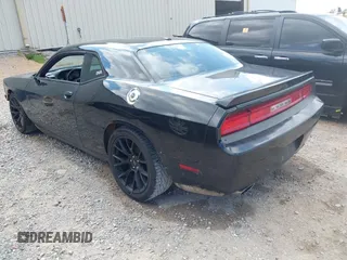 2014 Dodge Challenger R/T Plus z VIN 2C3CDYBT1EH201887, wystawiony jako IAAI lot #42225211 z przebiegiem 278 574 mil mil oraz . Historia ofert i sprzedaży dostępna na DreamBid. Obrazek 3.