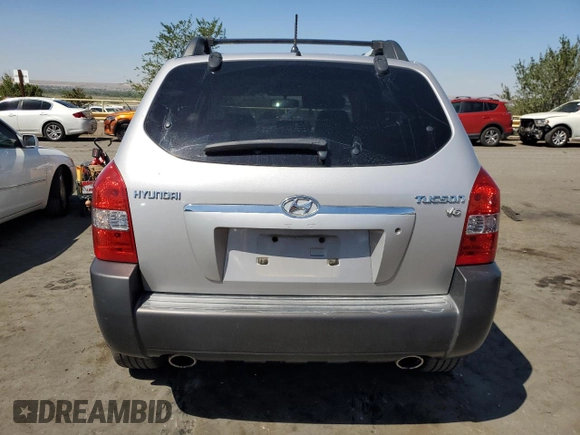 2006 Hyundai Tucson GLS with VIN KM8JN12D16U439636, listed as a Copart auction lot 71318684 with 140,225 mi miles and Salvage Title. Bid and sale history available at carsss.com. Image 6.
