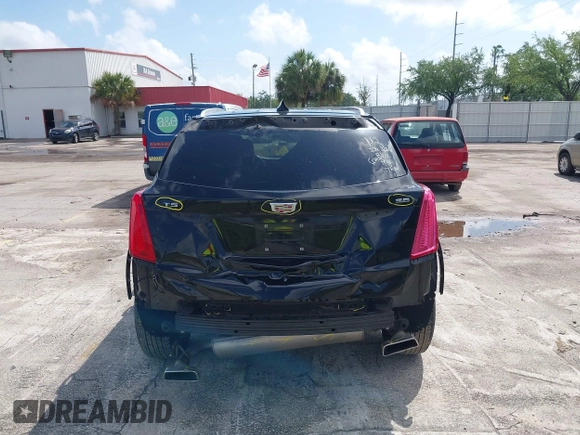 2017 Cadillac XT5 FWD with VIN 1GYKNARS6HZ123114, listed as a IAAI auction lot 41933928 with 166,213 mi miles. Bid and sale history available at carsss.com. Image 6.