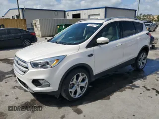 2019 Ford Escape Titanium with VIN 1FMCU9J92KUA55656, listed as a Copart auction lot 52233235 with 57,052 mi miles and Non Repairable. Bid and sale history available at carsss.com. Image 1.