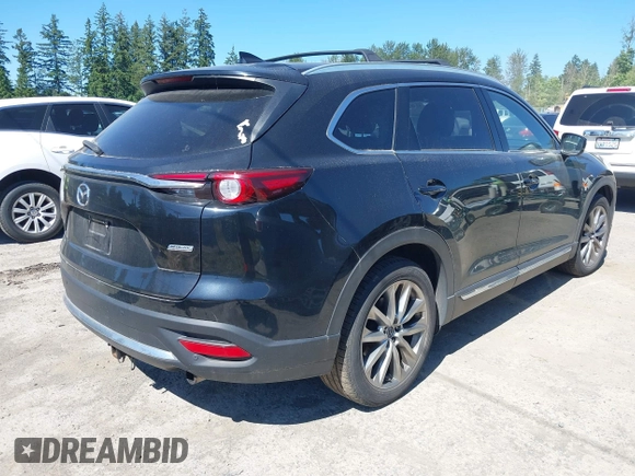2018 Mazda CX-9 Grand Touring z VIN JM3TCBDY2J0237050, wystawiony jako IAAI lot #42457060 z przebiegiem 130 625 mil mil oraz . Historia ofert i sprzedaży dostępna na DreamBid. Obrazek 4.
