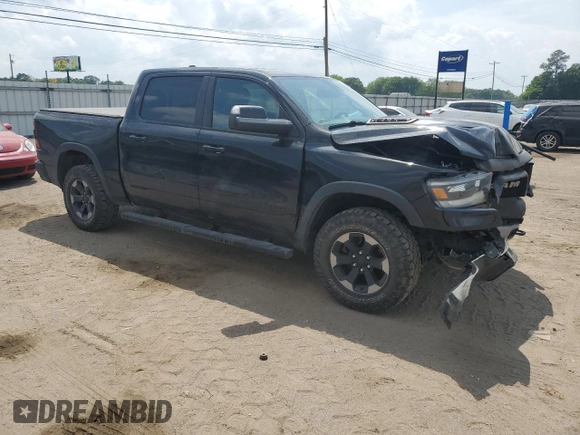 2019 Ram 1500 Rebel z VIN 1C6SRFLT8KN618140, wystawiony jako Copart lot #54734815 z przebiegiem 145 040 mil mil oraz Szkoda całkowita • Salvage title. Historia ofert i sprzedaży dostępna na DreamBid. Obrazek 4.