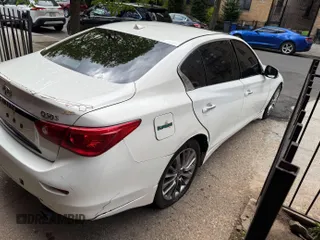 2014 Infiniti Q50 Sport with VIN JN1BV7AP7EM689505, listed as a IAAI auction lot 42172352 with 133,824 mi miles and . Bid and sale history available at DreamBid. Image 4.