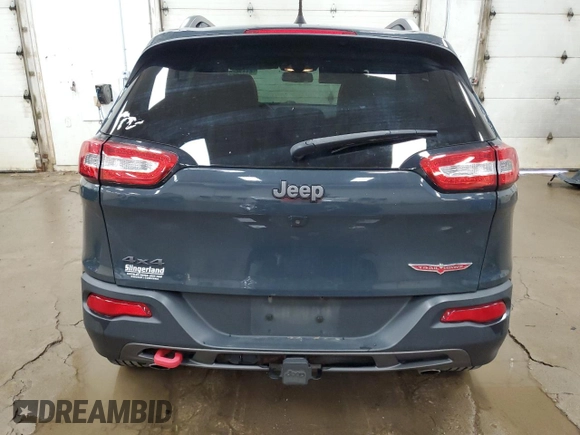 2016 Jeep Cherokee Trailhawk z VIN 1C4PJMBS5GW179273, wystawiony jako Copart lot #61175695 z przebiegiem 110 295 mil mil oraz Czysty tytuł • Clean title. Historia ofert i sprzedaży dostępna na DreamBid. Obrazek 6.