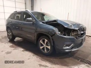 2020 Jeep Cherokee Limited z VIN 1C4PJMDX2LD516951, wystawiony jako IAAI lot #41272629 z przebiegiem 99 717 mil mil oraz . Historia ofert i sprzedaży dostępna na DreamBid. Obrazek 1.