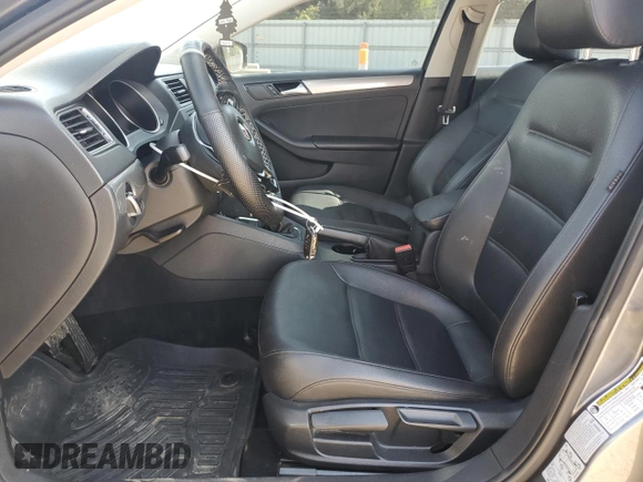 2015 Volkswagen Jetta SE with VIN 3VWD17AJ7FM224867, listed as a Copart auction lot 62105405 with 126,330 mi miles and Salvage title. Bid and sale history available at DreamBid. Image 7.