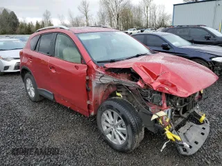 2016 Mazda CX-5 Touring with VIN JM3KE4CY5G0786849, listed as a Copart auction lot 47552765 with 0 mi miles and Salvage Title. Bid and sale history available at carsss.com. Image 4.