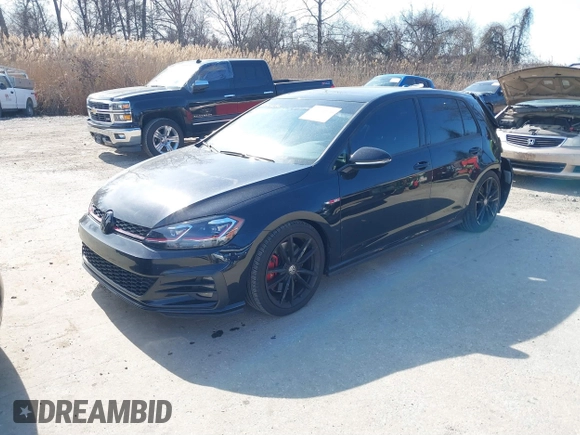 2021 Volkswagen Golf GTI S with VIN 3VW5T7AU6MM009986, listed as a IAAI auction lot 41744096 with 26,120 mi miles. Bid and sale history available at carsss.com. Image 2.