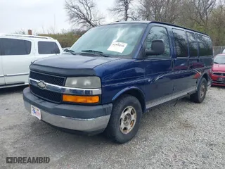 2004 Chevrolet Express Passenger with VIN 1GBFG15T441159106, listed as a IAAI auction lot 41999210 with 245,286 mi miles. Bid and sale history available at carsss.com. Image 2.