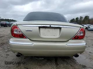 2006 Jaguar XJ with VIN SAJWA79B76SH08803, listed as a Copart auction lot 40268774 with 0 mi miles and Salvage Title. Bid and sale history available at carsss.com. Image 6.