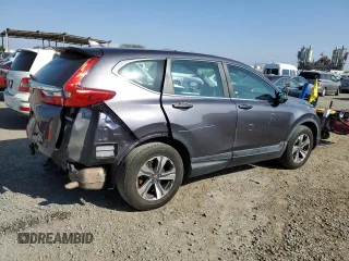 2019 Honda CR-V LX with VIN 2HKRW5H38KH418961, listed as a Copart auction lot 50594165 with 81,425 mi miles and Salvage Title. Bid and sale history available at DreamBid. Image 3.