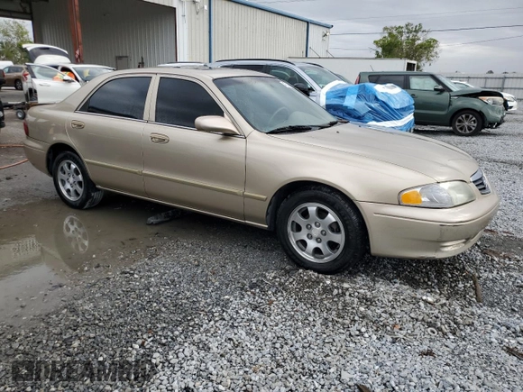 2001 Mazda 626 LX z VIN 1YVGF22CX15238033, wystawiony jako Copart lot #47245985 z przebiegiem 91 735 mil mil oraz Szkoda całkowita • Salvage title. Historia ofert i sprzedaży dostępna na DreamBid. Obrazek 4.