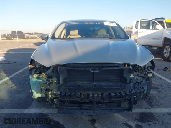 2015 Ford Fusion SE z VIN 3FA6P0H79FR137377, wystawiony jako IAAI lot #41345497 z przebiegiem 170 533 mil mil oraz . Historia ofert i sprzedaży dostępna na DreamBid. Obrazek 13.