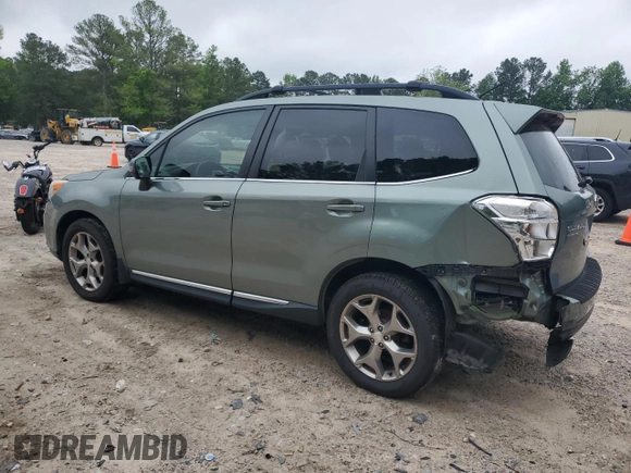 2015 Subaru Forester Touring with VIN JF2SJAWC0FH561212, listed as a Copart auction lot 56470495 with 100,730 mi miles and Salvage title. Bid and sale history available at DreamBid. Image 2.