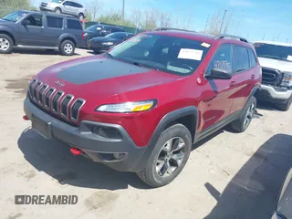 2016 Jeep Cherokee Trailhawk with VIN 1C4PJMBS9GW237059, listed as a IAAI auction lot 42079788 with 114,513 mi miles. Bid and sale history available at carsss.com. Image 18.