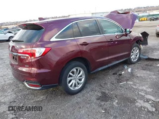 2017 Acura RDX w/Technology Pkg with VIN 5J8TB4H5XHL029032, listed as a IAAI auction lot 40982964 with 124,253 mi miles. Bid and sale history available at carsss.com. Image 4.