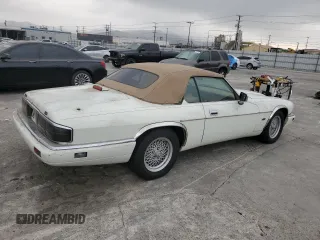 1994 Jaguar XJS with VIN SAJNX2749RC191243, listed as a Copart auction lot 76037994 with 74,842 mi miles and Salvage Title. Bid and sale history available at carsss.com. Image 3.