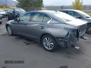 2017 Infiniti Q50 Premium with VIN JN1EV7AR2HM830032, listed as a IAAI auction lot 40777161 with 104,834 mi miles and . Bid and sale history available at DreamBid. Image 3.