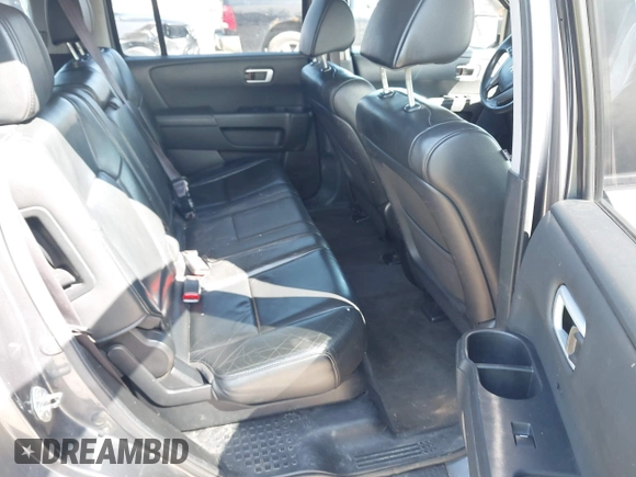 2012 Honda Pilot EX-L with VIN 5FNYF4H55CB040430, listed as a IAAI auction lot 41952800 with 247,175 mi miles and . Bid and sale history available at DreamBid. Image 8.