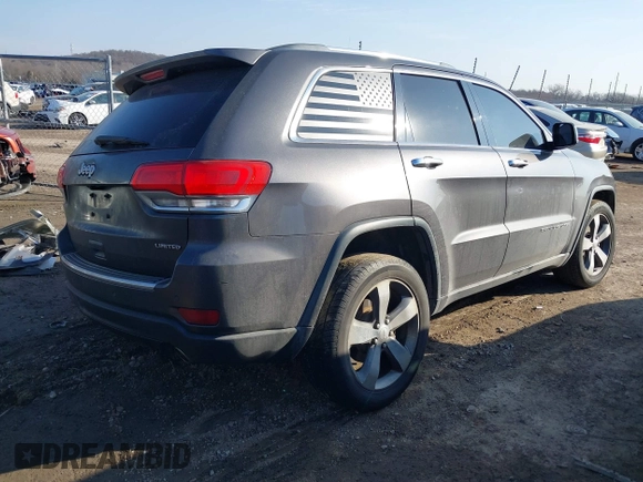 2014 Jeep Grand Cherokee Limited with VIN 1C4RJEBGXEC499052, listed as a IAAI auction lot 41665838 with 160,473 mi miles. Bid and sale history available at carsss.com. Image 4.