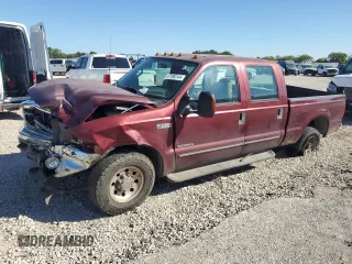 2000 Ford F-350 XL with VIN 1FTSW30F6YEB89796, listed as a Copart auction lot 67490144 with 517,242 mi miles and Salvage Title. Bid and sale history available at DreamBid. Image 1.