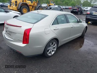 2015 Cadillac ATS Luxury RWD z VIN 1G6AB5RX8F0101942, wystawiony jako IAAI lot #42199906 z przebiegiem 58 627 mil mil oraz . Historia ofert i sprzedaży dostępna na DreamBid. Obrazek 4.
