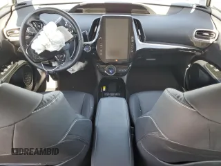 2021 Toyota Prius LE z VIN JTDKAMFP7M3191079, wystawiony jako Copart lot #57529195 z przebiegiem 52 809 mil mil oraz Szkoda całkowita • Salvage title. Historia ofert i sprzedaży dostępna na DreamBid. Obrazek 8.