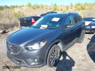 2016 Mazda CX-5 Grand Touring with VIN JM3KE4DY5G0843355, listed as a IAAI auction lot 41775499 with NaN miles. Bid and sale history available at carsss.com. Image 2.