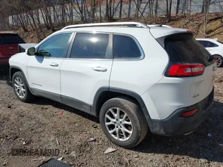 2015 Jeep Cherokee Latitude with VIN 1C4PJMCS7FW503594, listed as a IAAI auction lot 41792820 with 77,325 mi miles. Bid and sale history available at carsss.com. Image 3.
