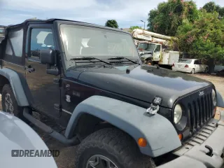 2012 Jeep Wrangler Sport with VIN 1C4AJWAG7CL258762, listed as a Copart auction lot 45012874 with Not provided miles and Non repairable. Bid and sale history available at DreamBid. Image 4.