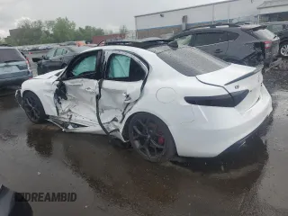 2021 Alfa Romeo Giulia Ti z VIN ZARFANBN1M7648754, wystawiony jako Copart lot #55331525 z przebiegiem Nie podano mil oraz Szkoda całkowita • Salvage title. Historia ofert i sprzedaży dostępna na DreamBid. Obrazek 2.