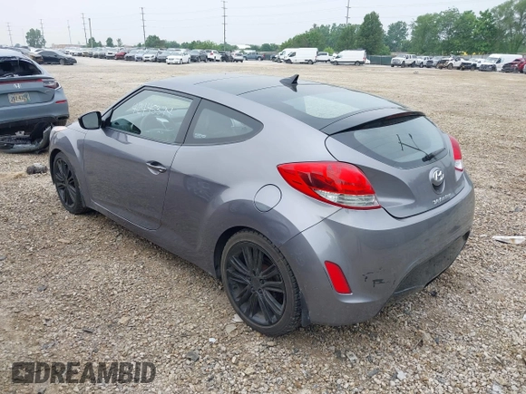2012 Hyundai Veloster w/Gray Int z VIN KMHTC6ADXCU030284, wystawiony jako IAAI lot #42445394 z przebiegiem 156 536 mil mil oraz . Historia ofert i sprzedaży dostępna na DreamBid. Obrazek 3.
