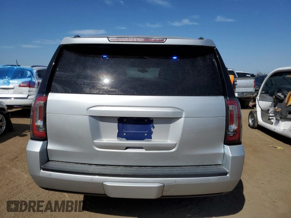 2016 GMC Yukon XL SLE with VIN 1GKS2FKC4GR285826, listed as a Copart auction lot 69486214 with 58,879 mi miles and Clean Title. Bid and sale history available at DreamBid. Image 6.