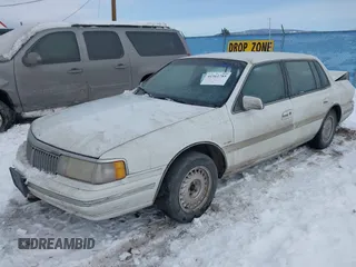 1991 Lincoln Continental with VIN 1LNCM9745MY632946, listed as a IAAI auction lot 41561785 with 124,186 mi miles and . Bid and sale history available at DreamBid. Image 18.