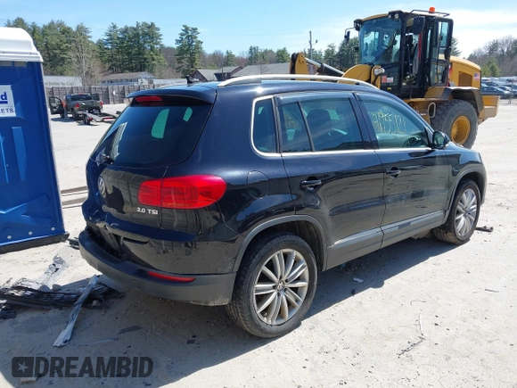 2012 Volkswagen Tiguan SEL with VIN WVGAV7AX2CW529232, listed as a IAAI auction lot 41955121 with 164,885 mi miles and . Bid and sale history available at DreamBid. Image 4.