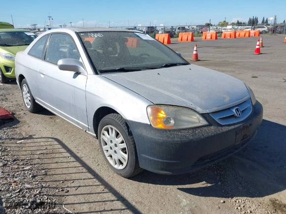 2003 Honda Civic EX with VIN 1HGEM229X3L072586, listed as a IAAI auction lot 40634772 with 202,134 mi miles. Bid and sale history available at carsss.com. Image 1.