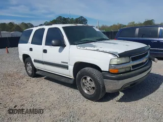 2002 Chevrolet Tahoe LS with VIN 1GNEC13V52J284059, listed as a IAAI auction lot 41899231 with 390,173 mi miles. Bid and sale history available at carsss.com. Image 1.