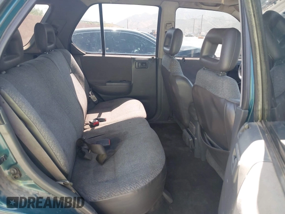 1998 Isuzu Rodeo S z VIN 4S2CM58W8W4328196, wystawiony jako IAAI lot #42323556 z przebiegiem 272 915 mil mil oraz . Historia ofert i sprzedaży dostępna na DreamBid. Obrazek 8.