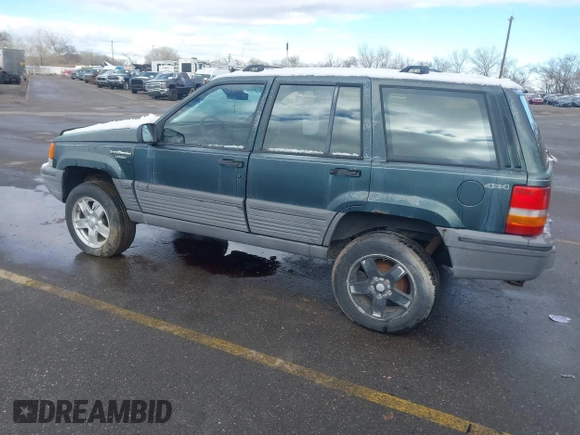 1993 Jeep Grand Cherokee Laredo with VIN 1J4GZ58Y9PC583439, listed as a IAAI auction lot 41794732 with 211,691 mi miles and . Bid and sale history available at DreamBid. Image 3.