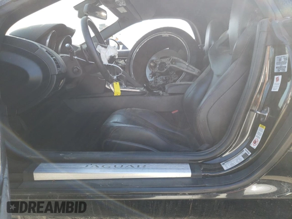 2014 Jaguar F-Type V6 with VIN SAJWA6E75E8K03346, listed as a Copart auction lot 69998944 with Not Provided miles and Salvage Title. Bid and sale history available at DreamBid. Image 7.