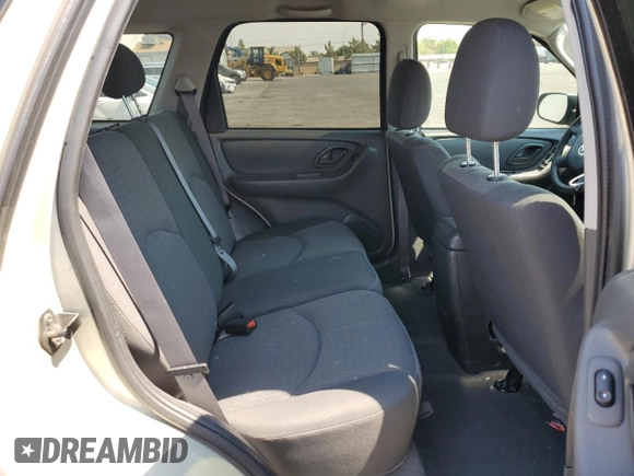 2005 Mazda Tribute i with VIN 4F2YZ02Z65KM01780, listed as a Copart auction lot 70890314 with 119,107 mi miles and Salvage Title. Bid and sale history available at carsss.com. Image 10.