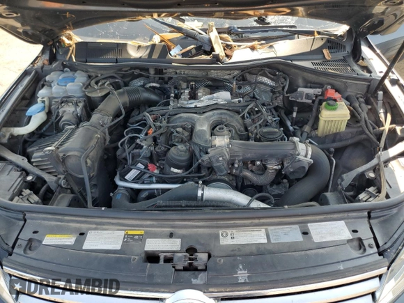 2015 Volkswagen Touareg Lux с VIN WVGEP9BP6FD003059, выставлен на аукционе Copart как лот 59670505 с пробегом 162 945 миль миль и Списание • Salvage title. История ставок и продаж доступна на DreamBid. Изображение 12.
