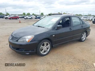 2006 Mitsubishi Lancer with VIN JA3AJ66F36U048382, listed as a IAAI auction lot 42138219 with 153,603 mi miles and . Bid and sale history available at DreamBid. Image 2.