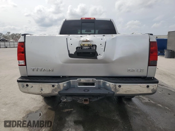 2006 Nissan Titan SE с VIN 1N6BA06A16N571799, выставлен на аукционе Copart как лот 46093745 с пробегом 118 019 миль миль и Списание • Salvage title. История ставок и продаж доступна на DreamBid. Изображение 6.