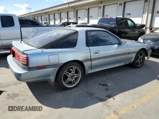1989 Toyota Supra z VIN JT2MA70J8K0120446, wystawiony jako Copart lot #75893804 z przebiegiem 283 887 mil mil oraz Szkoda całkowita • Salvage title. Historia ofert i sprzedaży dostępna na DreamBid. Obrazek 3.