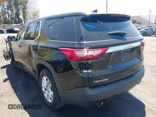 2019 Chevrolet Traverse LS z VIN 1GNERFKW3KJ222388, wystawiony jako IAAI lot #42225444 z przebiegiem 94 777 mil mil oraz . Historia ofert i sprzedaży dostępna na DreamBid. Obrazek 3.