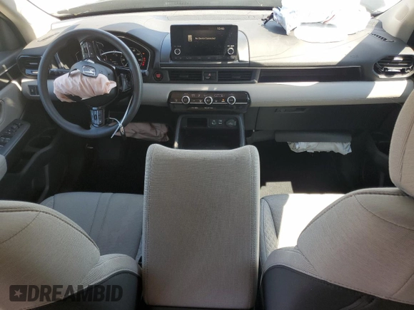 2023 Honda Pilot LX with VIN 5FNYG2H21PB004294, listed as a Copart auction lot 58257395 with 31,498 mi miles and Salvage title. Bid and sale history available at DreamBid. Image 8.