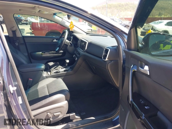 2020 Kia Sportage EX with VIN KNDPNCAC3L7752538, listed as a IAAI auction lot 42060920 with 68,740 mi miles and . Bid and sale history available at DreamBid. Image 5.